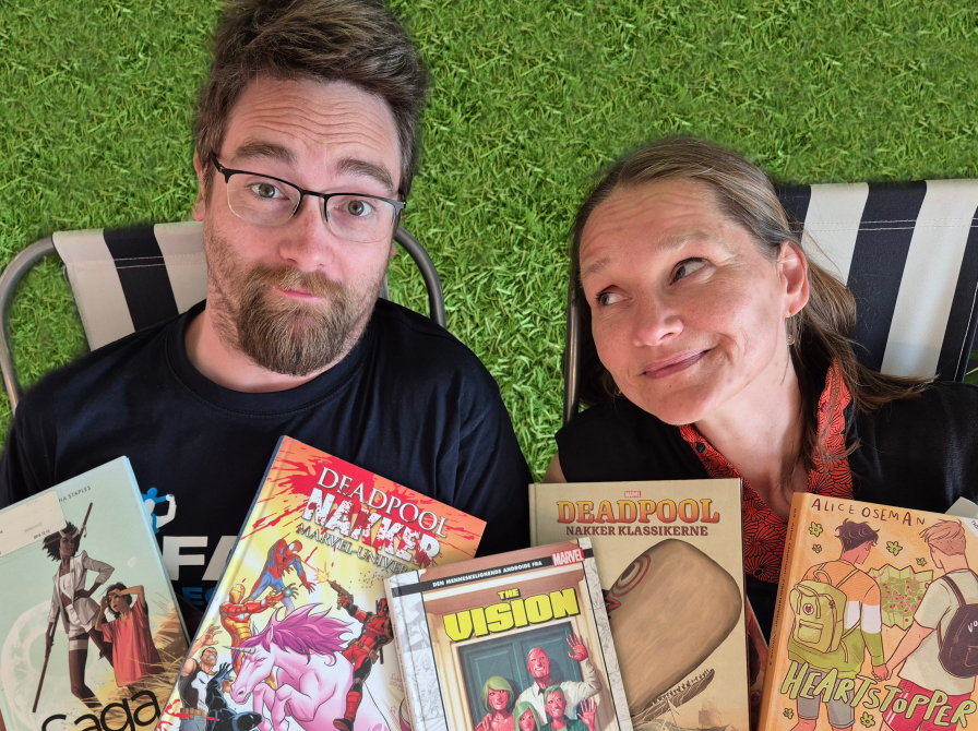 Teddy og Mette omgivet af tegneserier